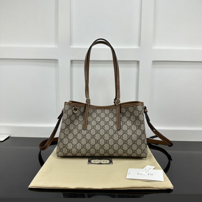 G*u*i shopping bags